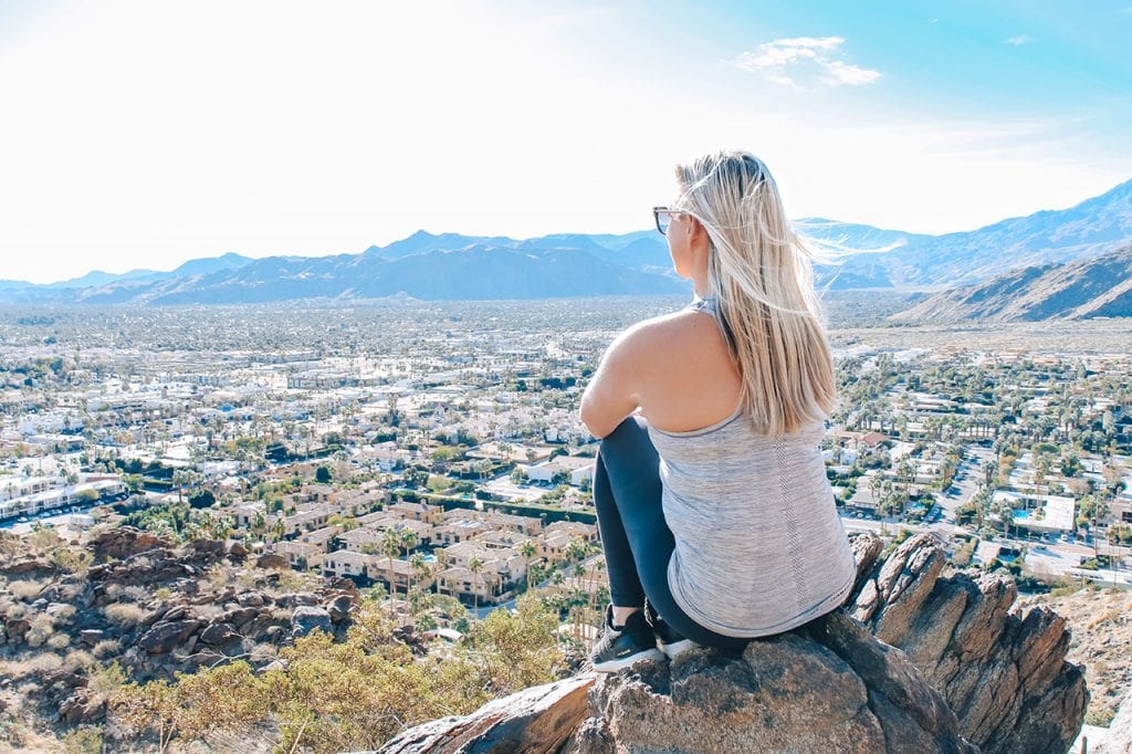 woman looking out over downtown palm springs